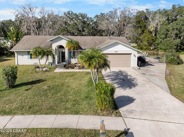 single story home with a garage and a front yard