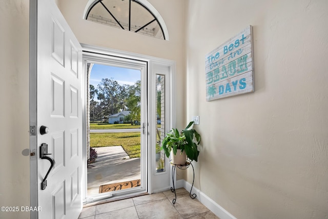 doorway featuring light tile patterned floors