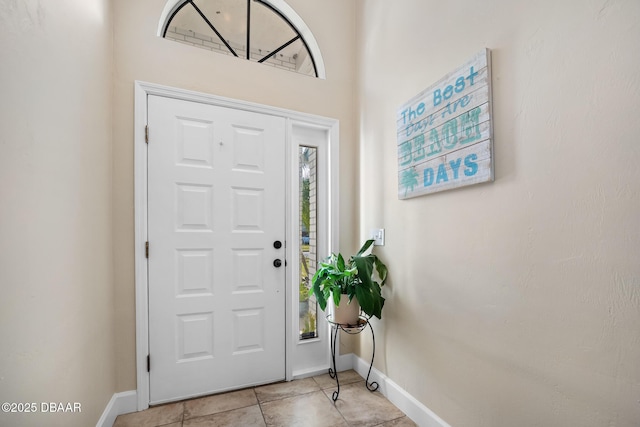 entryway featuring light tile patterned flooring