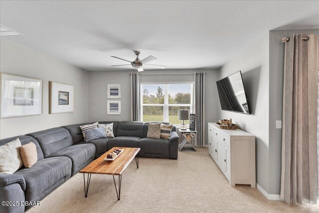 2714 Neverland Dr, New Smyrna Beach, FL 32168 - living room with light colored carpet and ceiling fan