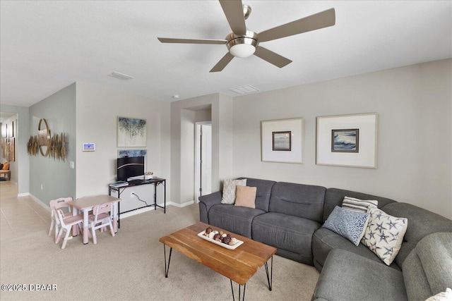 2714 Neverland Dr, New Smyrna Beach, FL 32168 - living room featuring a ceiling fan and light carpet