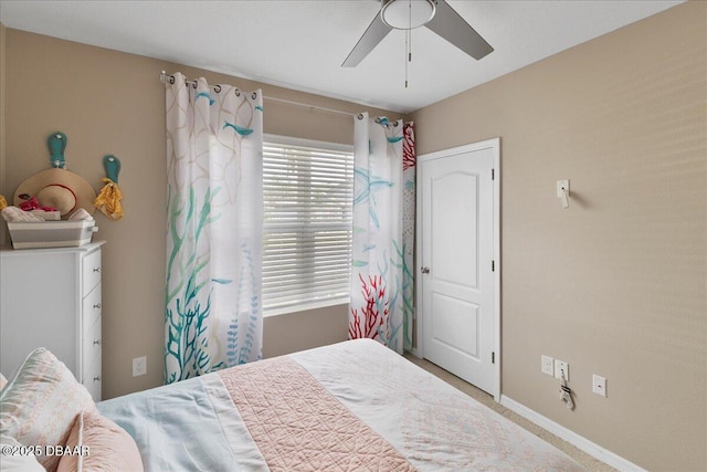 2714 Neverland Dr, New Smyrna Beach, FL 32168 - bedroom with carpet flooring and a ceiling fan