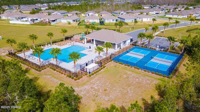 2714 Neverland Dr, New Smyrna Beach, FL 32168 - aerial perspective of suburban area with a pool area