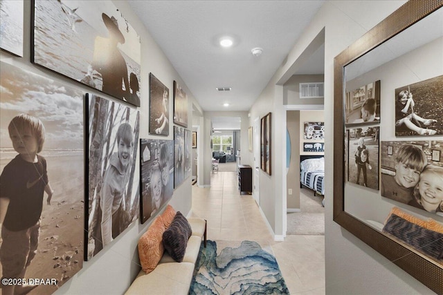 2714 Neverland Dr, New Smyrna Beach, FL 32168 - hallway with light tile patterned floors and baseboards