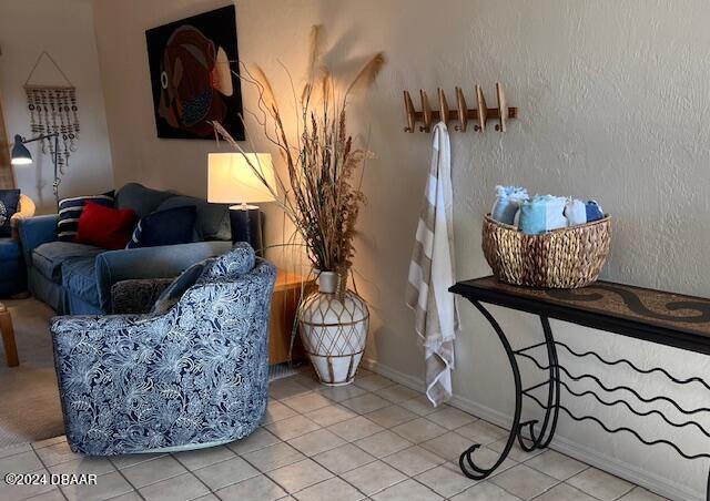 4175 S Atlantic Ave Unit 1240, New Smyrna Beach, FL 32169 - sitting room with tile patterned floors