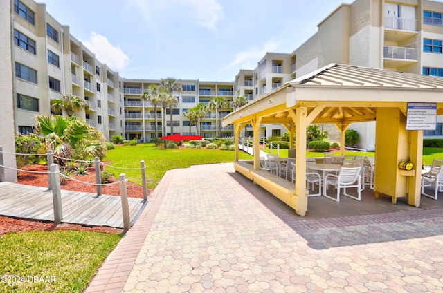 4175 S Atlantic Ave Unit 1240, New Smyrna Beach, FL 32169 - view of property's community featuring a lawn and a gazebo