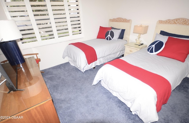 4175 S Atlantic Ave Unit 1240, New Smyrna Beach, FL 32169 - bedroom featuring dark carpet