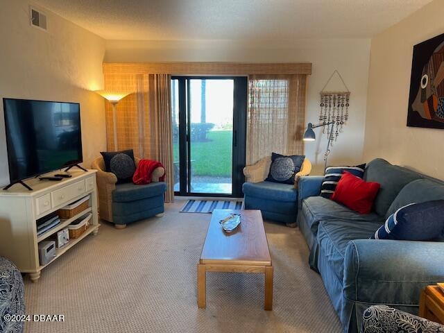 4175 S Atlantic Ave Unit 1240, New Smyrna Beach, FL 32169 - view of carpeted living room