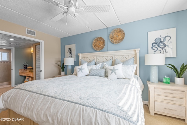 carpeted bedroom featuring ceiling fan