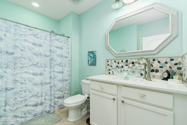 1748 Savannah Ln, Port Orange, FL 32128 - full bathroom featuring tile patterned flooring, toilet, vanity, and curtained shower