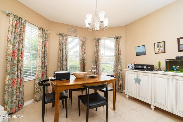 1748 Savannah Ln, Port Orange, FL 32128 - dining space featuring a chandelier, plenty of natural light, and light tile patterned flooring