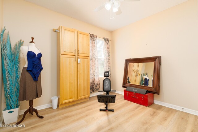1748 Savannah Ln, Port Orange, FL 32128 - living area with light wood finished floors, a ceiling fan, and baseboards