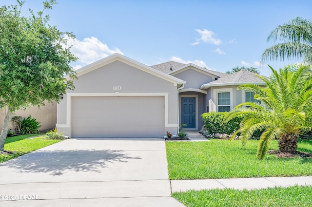 1748 Savannah Ln, Port Orange, FL 32128 - single story home with an attached garage, stucco siding, concrete driveway, and a front lawn