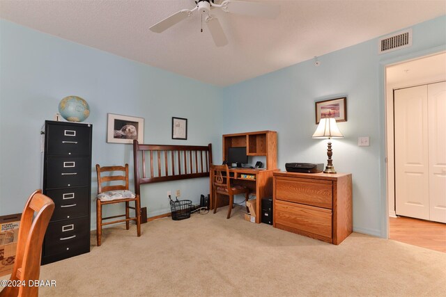 office featuring light colored carpet and ceiling fan