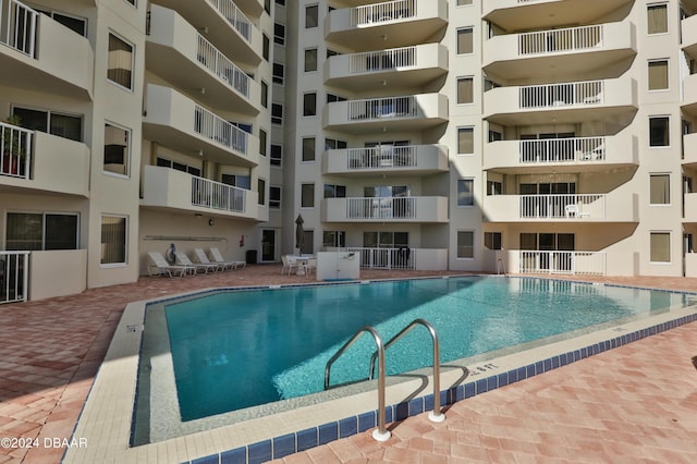 3 Oceans W Blvd Unit 5C4, Daytona Beach Shores, FL 32118 - community pool featuring a patio area