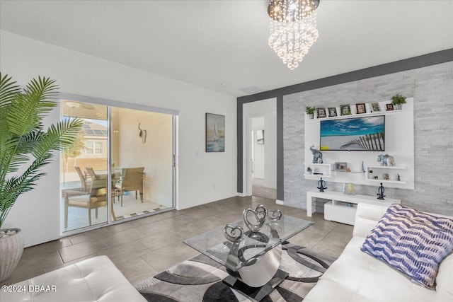 living room featuring tile patterned flooring and a chandelier