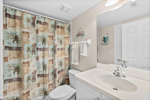 bathroom with a shower with curtain, vanity, and toilet