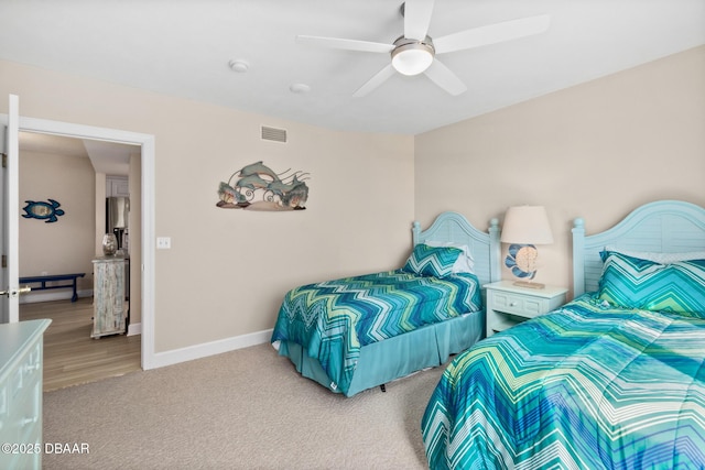 bedroom with ceiling fan and carpet floors