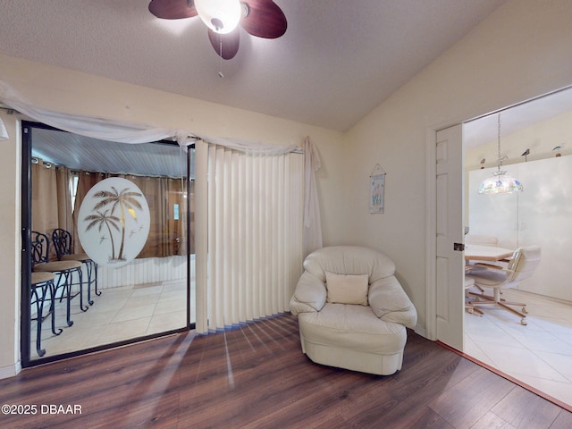 686 Middlebury Loop, New Smyrna Beach, FL 32168 - living area with wood finished floors, ceiling fan, lofted ceiling, and a chandelier