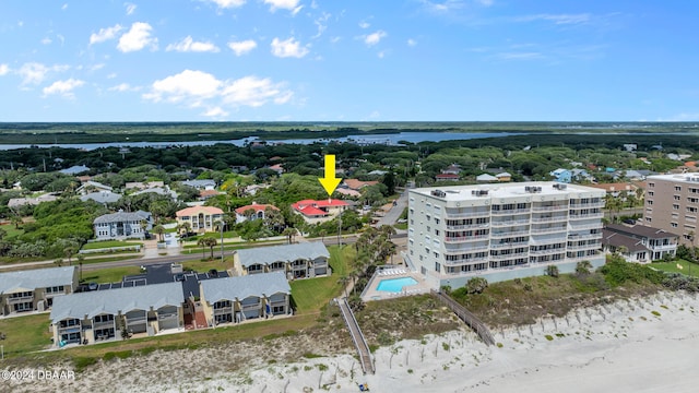 birds eye view of property featuring a water view