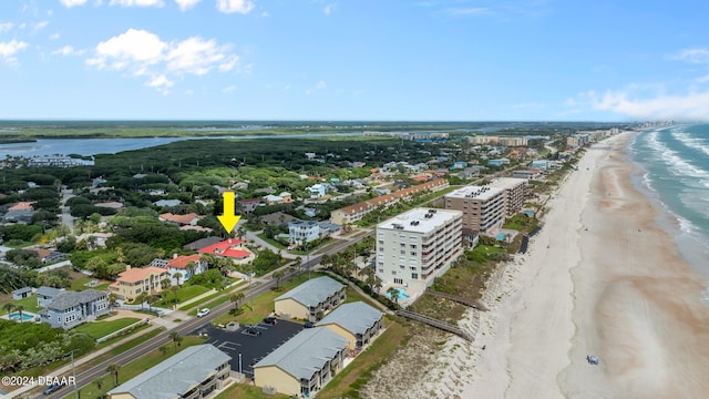 aerial view with a view of the beach and a water view