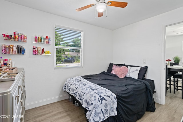 1318 San Jose Blvd, Daytona Beach, FL 32117 - bedroom featuring light wood-style floors, baseboards, and a ceiling fan