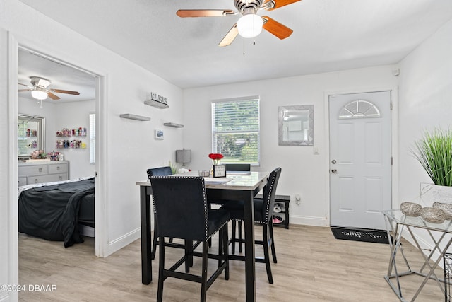 1318 San Jose Blvd, Daytona Beach, FL 32117 - dining room with a ceiling fan, light wood-style floors, and baseboards