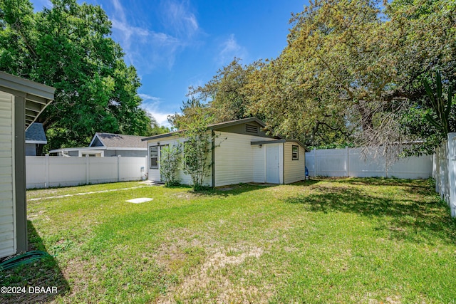 1318 San Jose Blvd, Daytona Beach, FL 32117 - view of yard with an outdoor structure