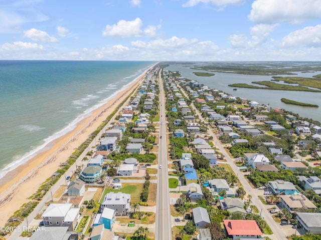 6361 Turtlemound Rd, New Smyrna Beach, FL 32169 - birds eye view of property featuring a beach view, a residential view, and a water view