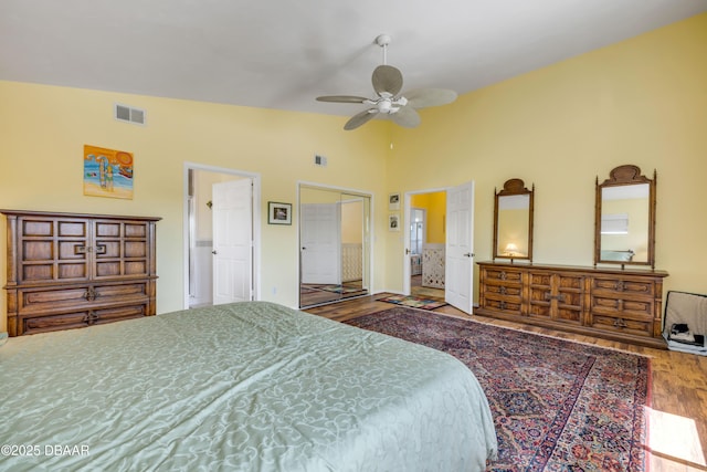 6361 Turtlemound Rd, New Smyrna Beach, FL 32169 - bedroom featuring high vaulted ceiling, wood finished floors, and visible vents