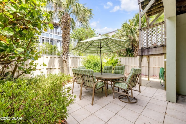 6361 Turtlemound Rd, New Smyrna Beach, FL 32169 - view of patio with outdoor dining area and fence