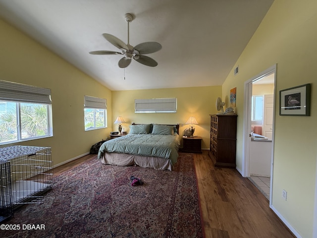 6361 Turtlemound Rd, New Smyrna Beach, FL 32169 - bedroom featuring visible vents, baseboards, wood finished floors, and vaulted ceiling
