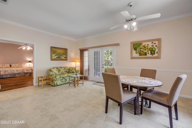 6361 Turtlemound Rd, New Smyrna Beach, FL 32169 - dining area with crown molding and a ceiling fan