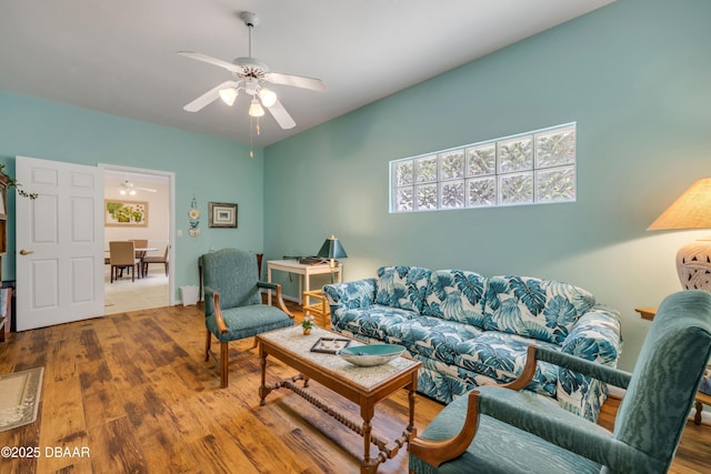 6361 Turtlemound Rd, New Smyrna Beach, FL 32169 - living room featuring a ceiling fan and wood finished floors