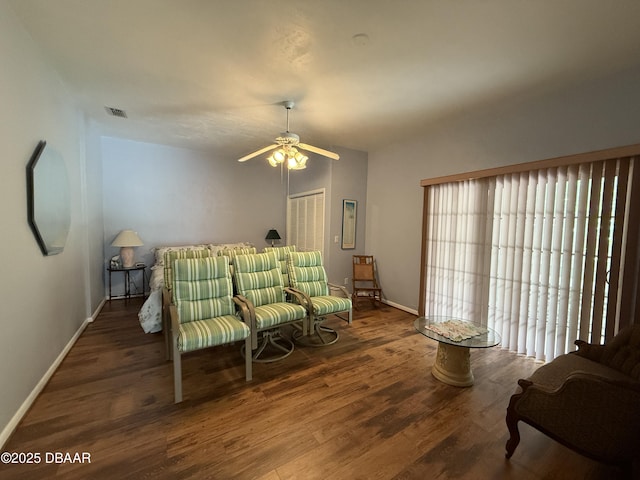 6361 Turtlemound Rd, New Smyrna Beach, FL 32169 - bedroom with baseboards, a ceiling fan, wood finished floors, and visible vents