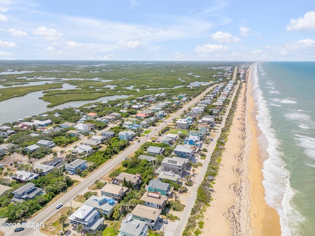 6361 Turtlemound Rd, New Smyrna Beach, FL 32169 - drone / aerial view featuring a water view, a view of the beach, and a residential view