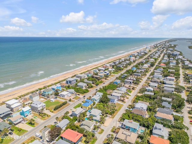 6361 Turtlemound Rd, New Smyrna Beach, FL 32169 - birds eye view of property featuring a beach view, a residential view, and a water view