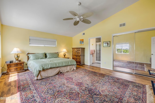 6361 Turtlemound Rd, New Smyrna Beach, FL 32169 - bedroom featuring a ceiling fan, visible vents, wood finished floors, high vaulted ceiling, and baseboards