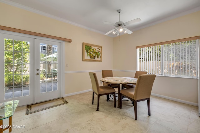 6361 Turtlemound Rd, New Smyrna Beach, FL 32169 - dining area featuring crown molding, baseboards, and ceiling fan