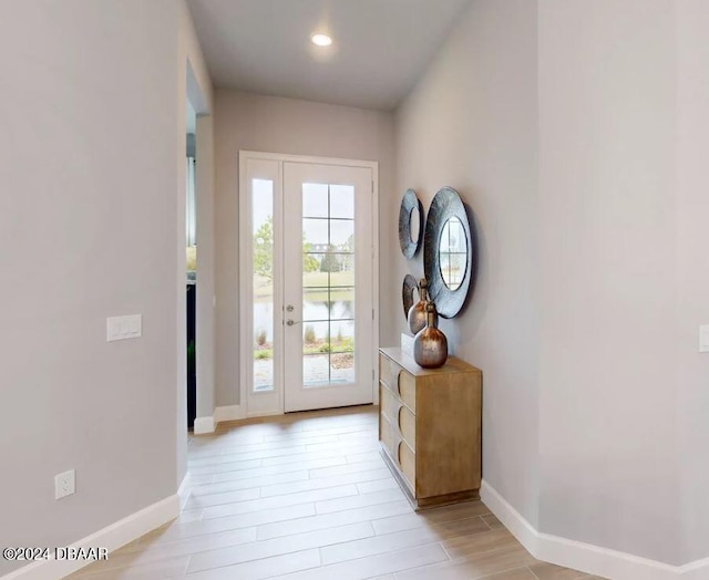 doorway featuring light wood-type flooring