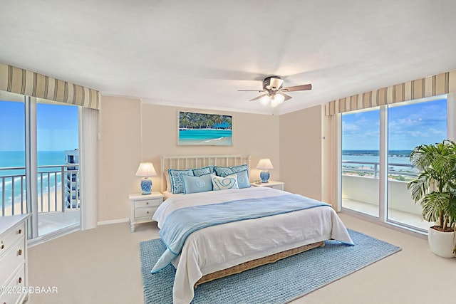 2545 S Atlantic Ave Unit 2107 2108, Daytona Beach Shores, FL 32118 - carpeted bedroom featuring a water view, access to exterior, and ceiling fan