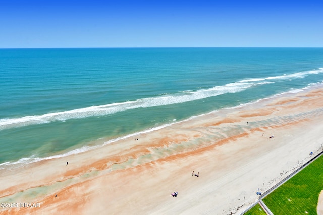 view of water feature with a beach view