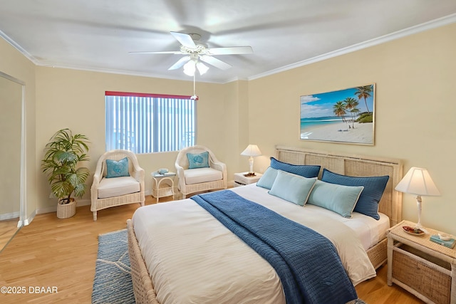 2545 S Atlantic Ave Unit 2107 2108, Daytona Beach Shores, FL 32118 - bedroom with wood finished floors, ornamental molding, baseboards, and a ceiling fan