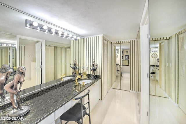 2545 S Atlantic Ave Unit 2107 2108, Daytona Beach Shores, FL 32118 - bathroom featuring tile patterned floors and vanity