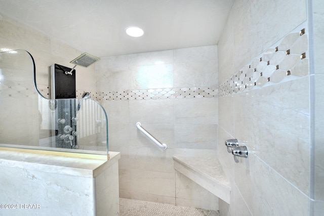 bathroom with tiled shower