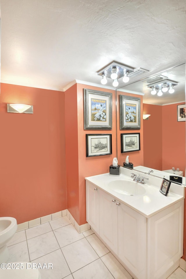 2545 S Atlantic Ave Unit 2107 2108, Daytona Beach Shores, FL 32118 - bathroom with vanity, baseboards, a textured ceiling, crown molding, and toilet