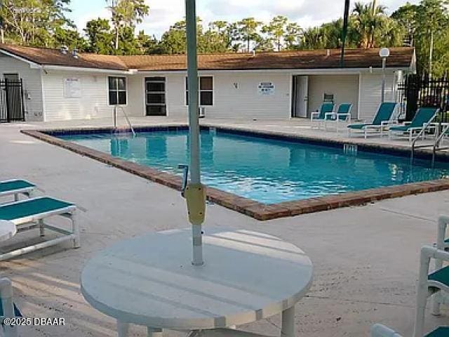 view of pool featuring a patio