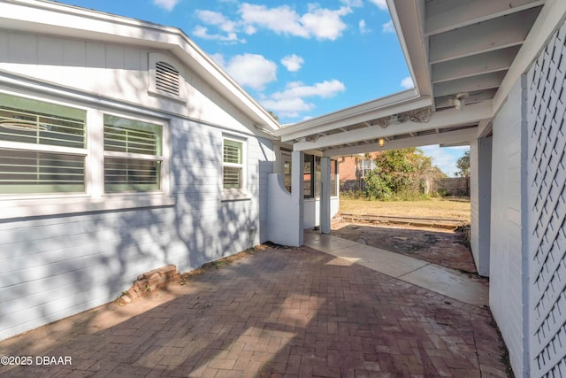 view of patio with fence