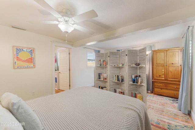 bedroom featuring visible vents and a ceiling fan