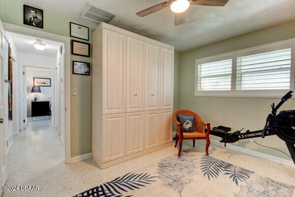 interior space featuring a closet and ceiling fan